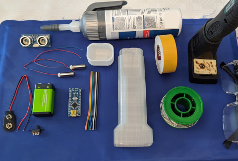 Bild der Komponenten des elektronischen Blindenstocks vor dem Zusammenbau